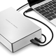 Illustration for article titled Porsche Designs New Desktop Drive Shares Power With Your 12-inch MacBook